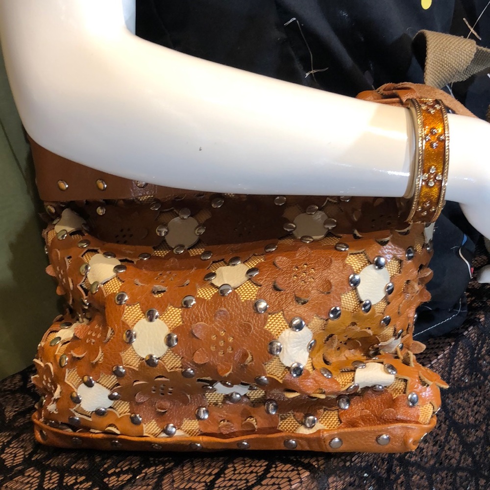 Leather purse & enamel bracelet duo. Hand cut